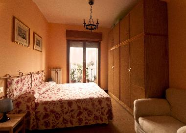 Pink room with double bed
