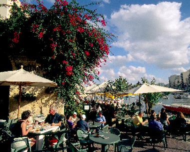 Many alfresco bars and restaurants alson the coast (this one on the opposite side of the apartments)