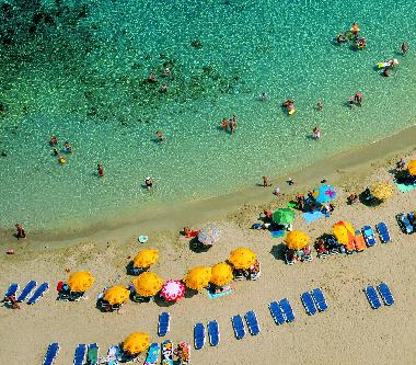 The closest sandy beach is 900m away (St Georges Bay).  the bigger Sandy beaches, like Paradise Bay,