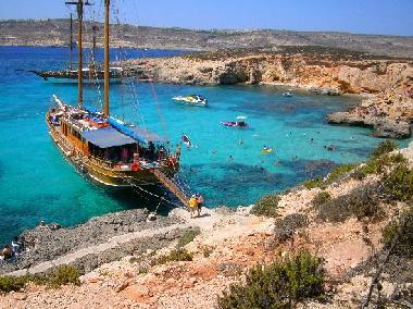 The Blu Lagoon in Comino.  Daily ferries and one day cruises depart from a nearby jetty.