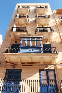 facade of building having Maltese architectural features
