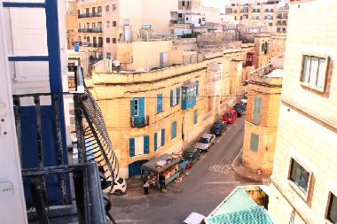 view of street and vegitable stall (mini market is also at 30 m from apartment)