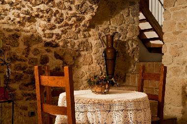 Our dining room with kitchen and fireplace