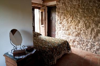 A bedroom between ancient stones...