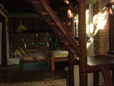 Tv room and stairs to the two lofts