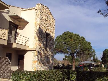 The side of the house and a part of the garden