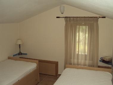 The upper room with two beds