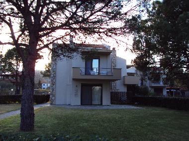 The house and a part of the garden as you see from the parking