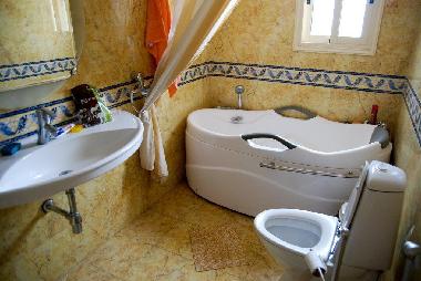 bathroom and toilet (from kitchen)