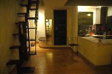 Open stair that gives access to the second floor