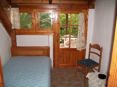 Upper floor room with one single bed