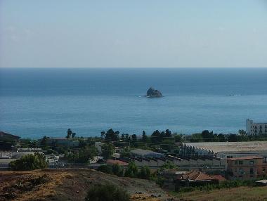Stone in the sea (sight from the balcony