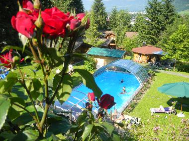 heated pool with panoramic pool cover 