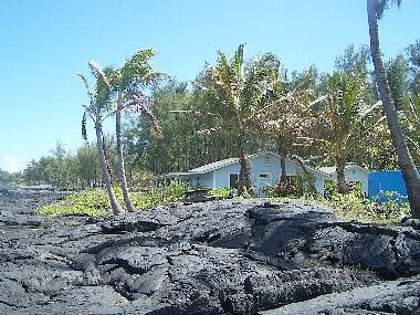 View from the a'a lava bluffs looking at the Alohahouse, Big Island vacation rental