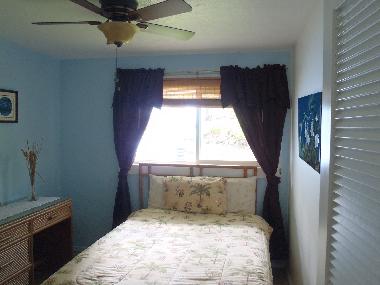 Full size bed in the "blue" room