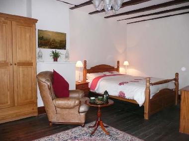 This bedroom also has a sofa bed.