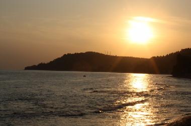 sunset from the beach in front of the house