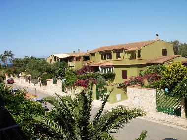 The view that you see from the windows of the flat, with the sea as background .