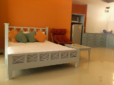 Downstairs living room which can sleep the 5th guest