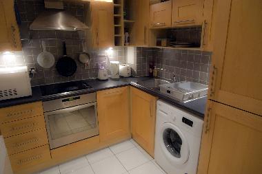 Kitchen - is fully equipped with everything you need, from electrical hardware to pots and plates.