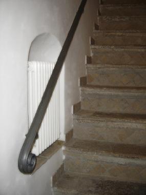 Stairs from the entrance that take to the main floor
