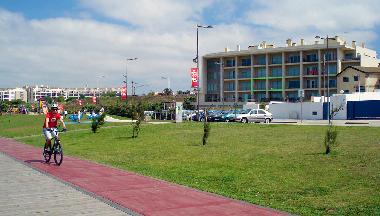 Apartment's building front view (apartment balconies framed in green)