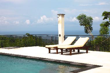 Sun beds and shower at terrace