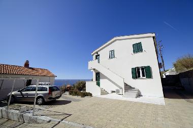 House - side  view and parking