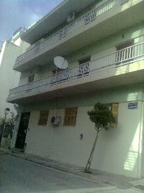 building with nearby small garden at basement