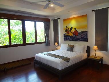 Thai bedroom with park and pool view