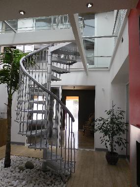 Stairway and glass floor landing