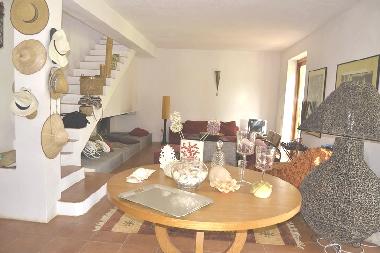 living room and stairs to bed rooms