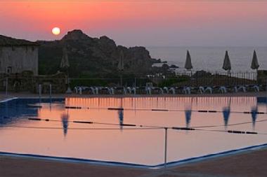 Sunset Over The Pool