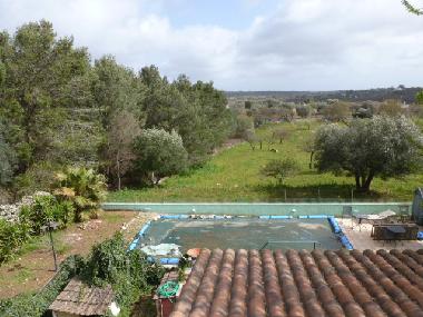 view from 1st floor terrace overlooking swimming pool