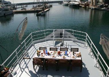 Dining area front deck,wide views over marina and to sea