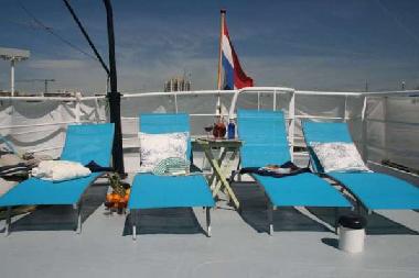 Sun chairs to relax and sun on deck