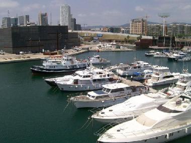 Boat is moored in Port Forum in Barcelona