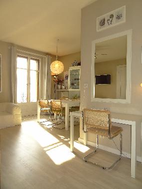 Clean, clean, clean and bright and airy with high ceilings and 2 sets of talll French doors to expan