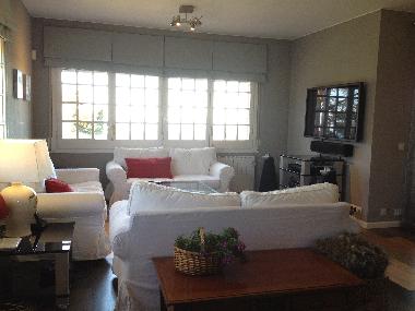 Living room with 3 sofas