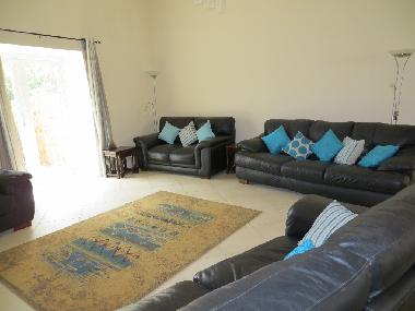 Spacious lounge opens to outside deck