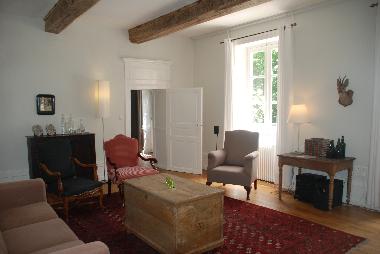 Sitting room with fireplace and satilite TV