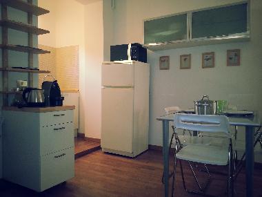 Living room with kitchenette corner
