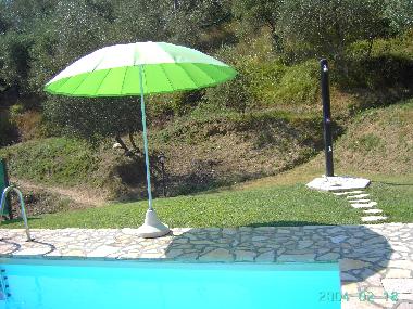 Solar shower near the pool