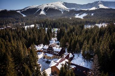 hotel location in the mountains at the lake