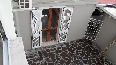 Courtyard with gate to the parking