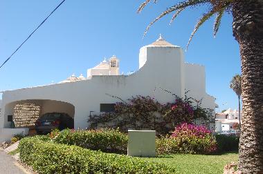 House entrance with parking area