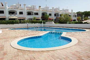 Swiming pool area children and adults