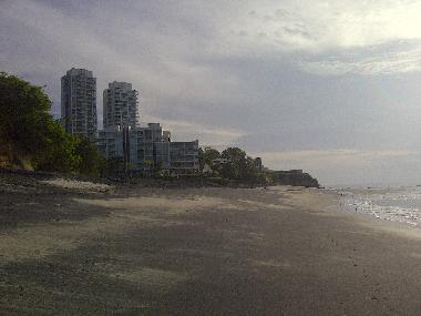 Short walk down the beach. Beach is a mix of fine white and volcanic sand.