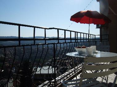 breakfast on the balcony taking in the views and enjoying fresh fruit from the local market