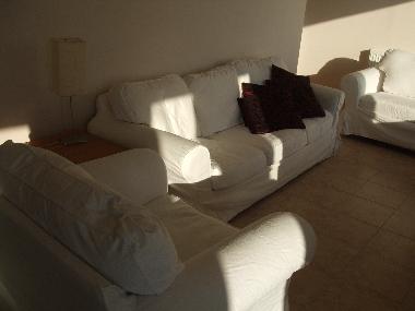 living room with comfortable sofas seating 6